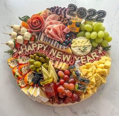 a platter filled with lots of different types of food