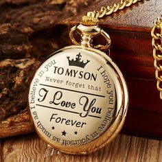 A traditional gold coloured quartz movement full hunter pocket watch, engraved with the personal message "To My Son I Love You Forever". This traditional accessory features a elegant white dial, encased within a white, roman numbered dial, with a sleek small red analog inner ring. The front and back opening case are polished for a lustrous shine, effortlessly releasing to reveal the unique face. Movement: Precise Quartz MovementMaterial: Stainless SteelDial Diameter: 4.8cmThickness: 13mm Message To My Son, Gold Pocket Watch, Pocket Watch Necklace, Children's Day Gift, Color Quartz, Fob Watch, To My Son, Pocket Watch Chain, Pendant Watches