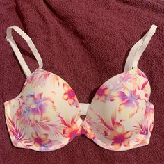 Brand New Victoria’s Secret Pushup T Shirt Bra In A Light Colorful Watercolor Print Lined In Hot Pink. Has Only Been Tried On Once, In Brand New Condition. Has Two/Hook:Eyes In The Back And Padded Straps. Size 32d Multicolor Push-up Bra For Summer, White Padded Bra For Spring, White Summer Vacation Bra, Spring White Padded Bra, White Push-up Swimwear For Beach, Spring Beach Push-up Bra, Casual White Bra For Summer, White Push-up Bra For Summer, Casual White Bra