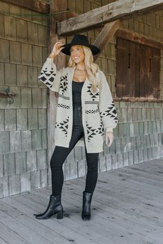 This Cream and Black Aztec Print Cardigan is a cozy yet stylish piece perfect for fall and winter! Long sleeves and an open front design for easy, effortless layering. Features a striking Aztec print in classic cream and black tones, adding a touch of boho flair. Ribbed detailing at the cuffs and hem provides a refined, finished look. Soft, comfortable fabric ensures all-day warmth and style. Layer this cardigan over a simple tee or blouse for an instant style upgrade, whether you're heading out Revival Clothing, Aztec Print Cardigan, Fall Style Guide, Aztec Cardigan, Gameday Dress, Black Tones, Loungewear Dresses, Casual White Dress, Game Dresses