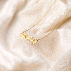 Gold name necklace,silver with name necklace,14k gold name plated,personalized name jewelry,gift for women,gift for girl,custom name jewelry, Birthday gift Name Size : 0,35 x1,25 inch / 9 X 32 mm Necklace size : 14" 16" 18" 20" 2" extension is available on all products material: 925 sterling silver finish color: 14k yellow gold plated, 14k rose gold plated chain model: cable chain 1.2mm chain extender: yes 2"(5cm) weigth: 2,4gr-3gr ideal chain size: 16"+2"extender (Best Seller) Your necklace is Name Necklace Silver, Nameplate Necklace, Gold Name Necklace, Jewelry Birthday, Chain Extenders, Name Jewelry, Necklace Size, Gold Plated Chains, Necklace Sizes