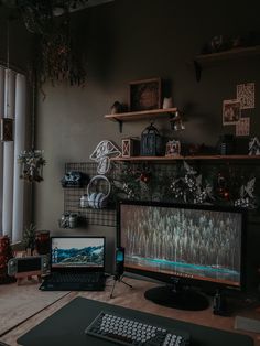 a desktop computer sitting on top of a wooden desk next to a keyboard and mouse