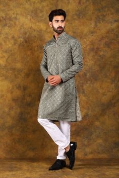 BLUESAANCHI MEN'S DARK GREY EMBROIDERED KURTA SET  This elegant dark grey kurta set from Bluesaanchi brings traditional design together with modern tailoring. Crafted with intricate embroidery, this kurta set is perfect for festive occasions, weddings, or any traditional gathering. Its timeless appeal ensures you make a stylish statement wherever you go.  Key Features  Beautiful dark grey shade with detailed embroidery  Regular fit for a comfortable yet stylish look  Full-sleeved kurta with a mandarin collar  Includes a matching churidar  Perfect for weddings, festivals, and cultural events   Specifications   Brand:  Bluesaanchi   Color:  Dark Grey   Fit:  Regular Fit   Pattern:  Embroidered   Sleeves:  Full Sleeves   Neck Type:  Mandarin Collar   Bottom Type:  Churidar   Occasion:  Ethnic Gray Traditional Wear For Festive Occasions, Gray Festive Traditional Wear, Festive Gray Traditional Wear, Traditional Gray Wear With Pallu, Gray Traditional Wear With Pallu, Gray Traditional Wear For Diwali, Festive Gray Traditional Wear With Pallu, Gray Traditional Wear With Zari Work For Diwali, Festive Unstitched Gray Kurta