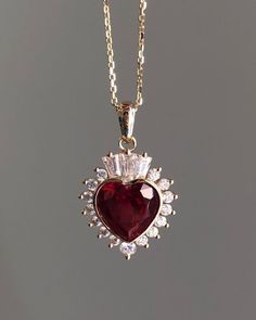 ------------------------------------------------------------------------------ ❤ Product Information ❤ ------------------------------------------------------------------------------ Vintage Herat Shape Ruby Gemstone Pendant,Heart Cut Ruby Gemstone Wedding Gift Pendant,Anniversary Gift For  ✥ 𝐌𝐚𝐢𝐧 𝐒𝐭𝐨𝐧𝐞 𝐃𝐞𝐭𝐚𝐢𝐥𝐬 ↣ Shape:  Heart Cut ↣ Type: Moissanite  ↣ Weight: 2.00 Carat (App.) ↣ Color: Colorless ↣ Clarity: VVS1 ↣ Making Process: Handmade - Crafted by our experienced team ✥ 𝐒𝐢𝐝𝐞 𝐒𝐭𝐨𝐧𝐞 𝐃𝐞𝐭𝐚𝐢𝐥𝐬 ↣ Shape: Round & Baguette Cut ↣ Type: Moissanite ↣ Weight: 0.50 Carat (App.) ↣ Color/: Colorless/ VVS-VS ↣ Options: Lab Grown Diamond and Natural Diamond (Possible on request while placing an order and Extra Chargeable Service) ✥ 𝐑𝐢𝐧𝐠 𝐃𝐞𝐭𝐚𝐢𝐥𝐬 ↣ Band Width: 1.8 Luxury Rose Gold Ruby Necklaces, Red Vintage Jewelry, Jewelry Design Aesthetic, Ruby Gemstone Aesthetic, Aesthetic Assecories, Ruby Aesthetic, Heart Jewlery, Red Ruby Necklace, Ruby Stone Ring