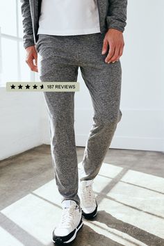 These men's performance joggers feature our ultra-soft Flowknit fabric. Featuring a slim but easy fit with the perfect amount of stretch for ultimate comfort. Guaranteed to be your new everyday pant.  | Quince | Men's Super Soft Performance Pants in Heather Grey, Flowknit Activewear, Recycled Polyester, Size XL Athleisure Elastane Pants With Side Pockets, Athleisure Elastane Pants With Pockets, Athleisure Pants With Side Pockets, Elastane, Gray Stretch Sweatpants With Pockets, Athleisure Pants With Pockets, Athleisure Pants With Side Pockets Made Of Elastane, Functional Activewear With Pockets For Loungewear, Yoga Pants With Side Pockets And 4-way Stretch, Casual Moisture-wicking Elastane Activewear