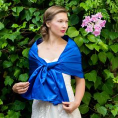 A very elegant satin shawl for your wedding party or evening dress. Made of a classical satin. Color: navy blue ( other colors are available ) Size : 180 cm x 40 cm You can use it as a wrap, shawl or stola. WE have matching bags in our Etsy Shop! WE accept credit cards! Elegant Satin Silk Scarf For Evening, Elegant Blue Satin Silk Scarf, Elegant Silk Scarf With Satin Finish For Weddings, Evening Silk Scarf With Satin Finish, Elegant Blue Silk Shawl Scarf, Elegant Blue Silk Shawl, Elegant Blue Silk Scarf For Wedding, Elegant Satin Shawl For Formal Occasions, Elegant Blue Silk Scarf For Evening