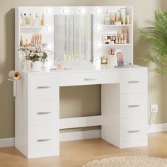 a white vanity with lights on it in a room