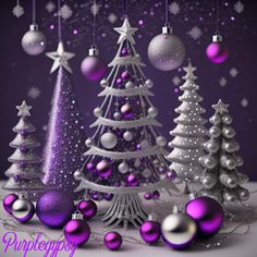 purple and silver christmas trees with ornaments