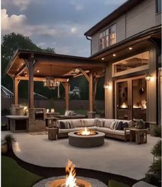 an outdoor living area with fire pit and seating