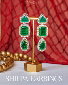 #IndianJewelry #PakistaniJewelry #Traditional Jewelry #EthnicJewelry #HandcraftedJewelry #ExquisiteDesigns #JewelryLovers #JewelryAddict #StatementJewelry #LuxuryJewelry #BridalJewelry #FashionAccessories #JewelryInspiration #JewelryGoals Green Temple Jewelry Handset Earrings, Elegant Green Earrings For Reception, Formal Emerald Earrings With Gemstone Accents, Elegant Emerald Earrings With Gemstone Accents, Elegant Green Bridal Earrings For Reception, Traditional Emerald Earrings For Party, Emerald Gemstone Earrings For Celebration, Elegant Earrings With Gemstone Accents For Festive Occasions, Hand Set Emerald Earrings For Party