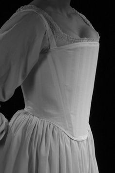 "This listing is for a full set of historic undergarments c. 1560 including a corset, chemise, and cone farthingale. Listed at 10% off for purchasing as the full ensemble. Included in this full historic ensemble: CORSET- The corset in this underwear ensemble is cut to enhance the square-necklines of Tudor and early Elizabethan period dresses. It is rigidly boned across the front with 1/2\" steel bones which lift and compress the bust, creating the conical shape of this period. The front neckline 18th Century Stays, Tudor Fashion, Tudor Costumes, Elizabethan Era, Period Clothing, Period Dress, Period Outfit, Century Clothing, Pearl Earring