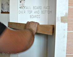 a man is working on a board and bottom boards in his home office, with the words install board face over top and bottom boards