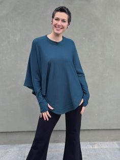 caraucci teal blue bamboo cotton fleece oversized poncho with thumbholes #color_teal Fleece Poncho, Poncho Top, Poncho Tops, Oversized Silhouette, Loose Tops, Cotton Fleece, Small Batches, Dresses With Leggings, Ponchos