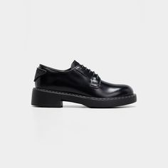 Prada derby loafers in calf leather 2.00 in / 50 mm flatform heel Almond toe Lace-up vamp Logo triangle at back  Leather/rubber outsole Made in Italy Prada Derby, Logo Triangle, Prada Leather, Bergdorf Goodman, Leather And Lace, Calf Leather, Derby, Dress Shoes Men, Oxford Shoes