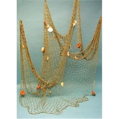 three fishing nets with shells on them