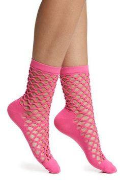 Fishnets meet crew socks in this edgy cotton-blend pair fashioned with a ribbed cuff to prevent slipping and an opaque footbed for comfort in every step. Cotton/polyester/spandex Machine wash, tumble dry Imported Trendy Stretch Summer Hosiery, Trendy Stretch Hosiery For Spring, Stretch Mesh Fishnet Socks, Stretch Fishnet Socks Made Of Mesh, Stretch Fishnet Mesh Socks, Stretchable Fishnet Mesh Socks, Fitted Fishnet Socks For Spring, Spring Fishnet Socks, Trendy Knee-high Spring Socks