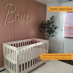 a white crib in front of a pink wall with the words, ship's next day