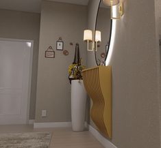 a hallway with a mirror, vase and lamp on the wall next to it's door