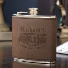 a brown flask is sitting on a table