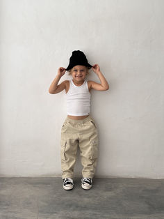 Saint-Toba's Cargo Skater Pants are the go-to for active little ones who rock a streetwise look. Paired with a classic white tank and a playful beanie, it’s the ultimate ensemble for your mini-fashionista's daily adventures. Relaxed Fit Cotton Cargo Shorts In Urban Style, Relaxed Fit Parachute Cargo Pants, Urban Style Khaki Parachute Cargo Pants, Relaxed Fit Cotton Cargo Shorts, Kids Baggy Cargo Pants, Sicker Than Your Average, Skater Pants, Kids Labels, Foo Fighters