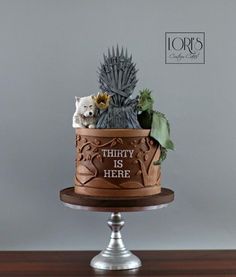 a game of throne cake on a table