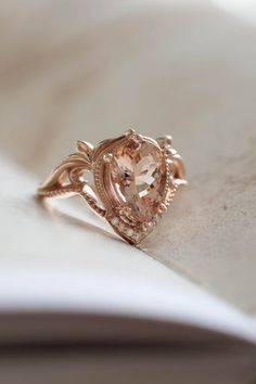 Morganite engagement ring in rose gold, statement ring with peach morganiteShop this style with different options: LidaThis listing is for the set of two rings:Lida engagement ring with 10x7 mm morganite and moissanites / diamondsChevron styl... Eden Garden, Peach Morganite, Gold Statement Ring, Morganite Engagement, Morganite Engagement Ring, Unique Engagement, Matching Band, Jewelry Business, Sparkle Diamonds