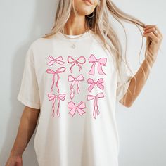 Handmade -This funny Unisex 'Dog Mom' tee is real life and inspirational, it's sure to be a hit! This would be the best gift for a special person in your life! Made with the softest trendy tees we all love! -This shirt is the perfect addition to anyone's wardrobe! Pairs great with leggings, jeans, and shorts as it can be dressed up or down! Its the perfect everyday look that everyone will love! -This updated irresistibly soft unisex tee essentially fits like a well-loved favorite featuring a uni Trendy Crew Neck T-shirt With Bow, Casual Short Sleeve T-shirt With Pink Bow, Cute Pink T-shirt With Bow, Cute Bow T-shirt For Spring, Cute White Top With Bow, Cute White Top With Bow Detail, Casual Cotton T-shirt With Pink Bow, Cute Cotton T-shirt With Bow Print, Spring Crew Neck T-shirt With Bow