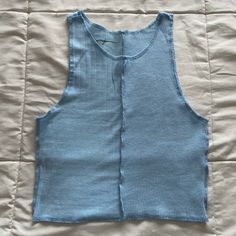 American Eagle Knit High-Neck Cropped Light Blue Tank Top Size Xs New Without Tags/ Never Worn Stitching Down The Middle Of Top Checkered Knit On Left And Thermal Waffle Knit On Right High-Neck High-Back Style Slim-Fit See Photos For Approximate Measurements Blue Ribbed V-neck Tank Top, Light Blue Knit V-neck Top, Blue Fitted V-neck Knit Top, Fitted Blue V-neck Knit Top, Blue Cotton Knit Top, Blue Stretch Knit Top, Summer Light Blue Knit Top With Crew Neck, Light Blue Crew Neck Knit Top For Summer, Light Blue Ribbed Knit Top