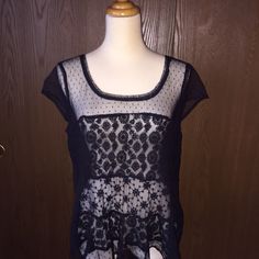 This Sheer And Flowy American Eagle Boho Top Is So Adorable! The Top Features Pindot Mesh In Black. The Front Has Two Panels Of Different Lace Mesh To Add Interest. It Is Completely Sheer. A Bralette, Cami Or Tank Looks Great Underneath. A Fashion Forward Boho Look. Super Cute! Shown On Mannequin Without Undergarments To Show The Detail Of The Fabric And Styled With A Tank As Well. Size Medium New, With Tag. Fitted Black Mesh Top With Lace Trim, Black Lace Top With Short Sleeves, Black Lace Mesh Top For Spring, Black Lace Mesh Top, Black Lace Short Sleeve Tops, Casual Fitted Mesh Top With Lace Details, Black Mesh Top With Lace Trim For Spring, Casual Fitted Sheer Lace Top, Casual Sheer Fitted Lace Top