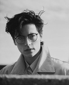 a black and white photo of a man wearing glasses with the words i know i don't stand a chance, but i am going to like you anyway