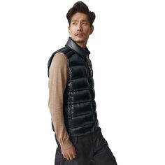 While we explore the Atlantic shore, we rely on the Crofton Vest's lightweight design and impressive insulation. From whale-watching tours to brisk seaside bike rides, this travel-ready vest warms our core and keeps us active. Water-shedding, wind-resistant ripstop allows duck down to keep its loft in unpredictable weather, and its compressible properties make it easy to stash and carry if the sun comes through. Casual Windproof Vest For Outdoor Activities, Casual Waterproof Vest For Outdoor Activities, Durable Functional Vest For Outdoor, Casual Waterproof Outdoor Vest, Nylon Windproof Vest For Outdoor Activities, Waterproof Winter Outdoor Vest, Functional Winter Vest For Outdoor, Casual Windproof Sports Vest, Sporty Windproof Vest For Outdoor