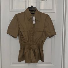 Women’s Tan Short Sleeve Button Up Blouse. With The Gold Buttons And Belt. Nwt. Size M Fitted Khaki Tops With Buttons, Khaki Fitted Button-up Top, Khaki Button Closure Blouse For Spring, Collared Khaki Top For Office, Khaki Collared Top For Office, Khaki Office Tops With Button Closure, Khaki Tops With Button Closure For Day Out, Khaki Button-up Office Tops, Khaki Button-up Workwear Blouse