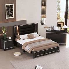 a bed room with a neatly made bed and two night stands