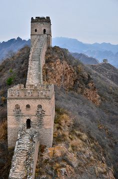 the great wall of china on top of a mountain