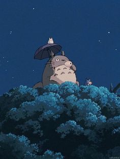 a person holding an umbrella standing on top of a lush green hillside under a night sky