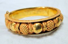 "22 k solid gold handmade bangle from Rajasthan Northern India. Inner diameter-5.5 cm(2.16\") , total inner circumference-17.27 cm(6.79\") we can adjust size, width-1.2 cm, weight-45 grams, material-22 K solid gold." Heavy Yellow Gold Bracelets For Formal Occasions, Formal Thick Yellow Gold Bracelet, Heavy Antique Gold Bracelets, Festive Yellow Gold Cuff Bracelet, Gold Bangle With Decorative Band As Gift, Gold Bangle Bracelet With Decorative Band For Wedding, Gold Round Cuff Bracelet For Festivals, Handmade Yellow Gold Bangle For Formal Occasions, Yellow Gold Bangle For Festivals