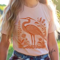 Heron Shirt Linocut Shirt Great Blue Heron Bird Lover Shirt Hippy Clothes Granola Girl Antique Folk Art Avian Aviary Gift Block Print Shirt - Etsy Summer Crew Neck T-shirt With Printing, Printed Short Sleeve T-shirt For Summer, Relaxed Fit Short Sleeve Pre-shrunk Shirt, Short Sleeve Shirt With Graphic Print, Summer Crew Neck Top With Printing, Summer Printed Crew Neck Top, Unisex Short Sleeve Summer Shirt, Unisex Graphic Print Short Sleeve Tops, Unisex Custom Print Shirt For Summer