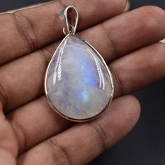 "Women\"s Natural Rainbow Moonstone Pendants, 925 Sterling Silver, Christmas Gifts, Silver Pendants, Gemstone Jewelry, Gift For Her, Pendants Material :- 925 Sterling Silver Pendant Size :- 35 x 21 mm Gemstone :- Natural Rainbow Moonstone Gemstone Size: 30 x 20 mm, Handmade Items **Made to Order** Delivery Time :- Once Item is shipped parcel will delivered to you in 2-4 weeks. C U S T O M I Z E O R D E R  All jewelry are made with solid 925 sterling silver. If you want to make any changes in this jewelry, then please send us message. We accept custom order also. All jewelry are nickle free. Visit our shop : https://www.etsy.com/in-en/shop/MiharSilverCrafts" Moonstone Teardrop Pendant Jewelry Gift, Silver Moonstone Teardrop Pendant, Silver Moonstone Teardrop Pendant Jewelry, Sterling Silver Drop Gemstones Gift, White Pendant Gemstone Gift, White Pendant Gemstone For Gifts, White Moonstone Jewelry, Keshi Pearl Necklace, Round Bead Necklace