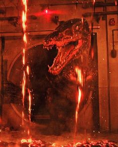 a large dinosaur is in the middle of a room with fire coming out of it