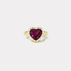 Ring crafted in 14k yellow gold with a 3.40ct heart shaped Garnet.  This ring is a size 5. This ring was handmade in Los Angeles. It is one of a kind and ready for immediate shipping. Heirloom Heart-shaped Gemstone Ring, Fine Jewelry Heart Ring With Bezel Setting, Fine Jewelry Heart Cut Ring With Bezel Setting, Heart Cut Bezel Set Heart Ring, Gold Heart Cut Ring With Bezel Setting, Heart Cut Rings With Bezel Setting, Heirloom Heart Cut Ring For Valentine's Day, Valentine's Day Heirloom Heart Cut Ring, Luxury Heart-shaped Ring With Center Stone