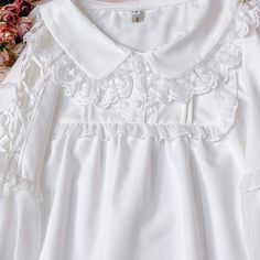 This price is for a blouse only.   	 		 			Size 			S 			M 			L 			XL 		 		 			Shoulders 			36 			37 			38 			39 		 		 			Bust 			90 			94 			98 			102 		 		 			Sleeve Length 			60 			61 			62 			63 		 		 			Full Length 			57 			58 			59 			60 Feminine Summer Blouse With Doll Collar, Elegant Summer Blouse With Doll Collar, Feminine Doll Collar Blouse For Summer, White Blouse With Peter Pan Collar For Spring, Long Sleeve Top With Lace Collar For Summer, White Blouse With Peter Pan Collar For Summer, White Tops With Cute Collar In Feminine Style, Feminine White Top With Cute Collar, Feminine White Blouse With Collar