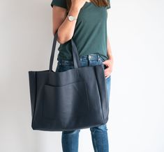 OVERSIZED LEATHER TOTE BAG - LEATHER SHOPPING BAG - LARGE TOTE This Leather Handbag is made of full grain, high quality natural leather. It's is very roomy - perfect for school, work and travel - great option as your everyday bag. Large interior provides a lot of space for all the daily essentials (books, cosmetic bag, accessories, laptop and other electronic devides, clothes and more). Inside the shopper bag there is an additional pocket with zipper for other small items. There is also large po Navy Satchel Bag For Shopping, Navy Satchel For Everyday Use, Navy Leather Shoulder Bag For On-the-go, Navy Bag With Removable Pouch For Shopping, Navy Bag With Removable Pouch For On-the-go, Navy Satchel With Removable Pouch For Everyday, Navy Bag With Leather Handles For Everyday, Navy Shopping Bag With Removable Pouch, Navy Satchel With Double Handle For Everyday Use