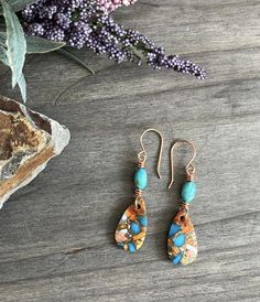 This is a pair of earring I made. These earrings feature a cool composite of spiny oyster, turquoise and copper piece under a lovely  Kingman turquoise bead. Completed with hand crafted copper wire fish hook ear wires. 2 1/4"overall.  #beadedartbyv #beadedearrings #beadedjewelry #HandCraftedJewelry #artisanjewelry #artisanmade  #spinyoysterjewelry Wire Fish, Spiny Oyster Turquoise, Spiny Oyster Jewelry, Oyster Turquoise, Southwest Style, Spiny Oyster, Kingman Turquoise, Wire Earrings, Copper Earrings