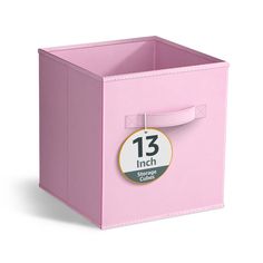 a pink storage cube with a 13 inch label on it