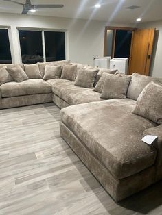 a large sectional couch in a living room