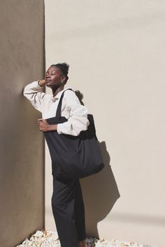 The Benny Tote is a perfect tote for filling up and carrying just about anywhere! This favorite seasonless staple packs up small and is perfect for carrying laundry, stowing a farmer's market bounty, or carrying all of your absolute favorite finds. We envision pairing one of our Benny Totes with a Na Nin Scrunchie and a stunning pair of earrings. 100% Fine Cotton Twill Made in USA Measurements: Approximately 18" length / 22" width / 6" gusset / 20.5" strap ﻿﻿Machine wash cold, separately, lay fl Farmer's Market, Egg Shells, Scrunchies, Cotton Twill, Onyx, Made In Usa, Normcore, Handbags