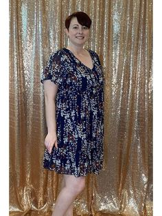 Brand: Miss SparklingDescription: Navy v-neck dress with white and red floral blossomsFit Info: Runs true to size; Emily is wearing a size XLLength: The length hits above the kneeBust: The bust runs true to sizeWaist: The waist runs true to sizeHips: The hips are flowyFabric: 100% PolyesterSize Reference: S: 2/4, M: 6/8, L: 8/10, XL: 12/14Emily:Size: 14/16Height 5'4Bust: 34DActual product colors may vary from the images shown due to different viewing devices and lighting. Short Sleeved Dress, Sleeved Dress, Navy Shorts, Classic Dress, White And Red, Dress Romper, Online Boutiques, V Neck Dress, Red Floral