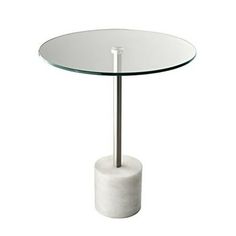 a white table with a glass top and silver metal base on an isolated white background