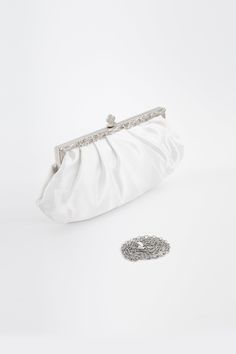 Embodying the spirit of the Roaring Twenties with its exquisite beadwork, this clutch exudes timeless sophistication, perfect for adding a touch of vintage charm to any ensemble. Features: High-quality satin material Magnetic clasp design Both long and short chains 10.6 inch / 27 cm x 5.1 inch / 13 cm ( L x H ) 1920s Accessories, 1920s Headpiece, Womens Handbag, Satin Clutch, The Roaring Twenties, Ladies Clutch, Peacock Wedding, 1920s Dress, Roaring Twenties