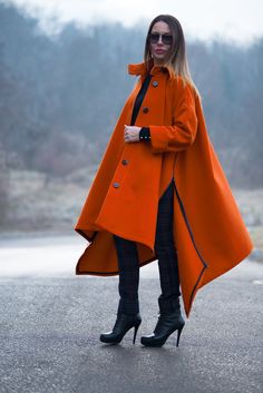 Women Trench Coat, Orange Maxi Asymmetric Zipper Coat. The Coat have 2 side pockets, zipper, buttons, collar wide sleeves. Don't have lining. SIZE & FIT: *Our Model is 5′6″ / 175 cm and wears size M. *Available Sizes: form XS up to 8XL *This product could be customized according to your measurements. *Please leave your requirements in the checkout. CARE Dry Cleaning Machine Wash 30oC Medium hot iron Time to ship & DELIVERY : Your piece will be ready to ship in 5-6 biz days upon placing y Luxury Orange Outerwear For Spring, Luxury Orange Outerwear For Fall, Luxury Casual Color Block Outerwear, Luxury Elegant Orange Outerwear, Luxury Orange Elegant Outerwear, Cape Coats For Women, High Low Coat, Wide Coat, Women Trench Coat